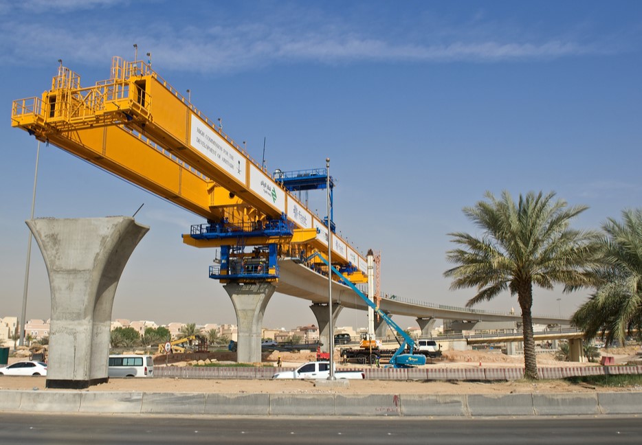 Manlift Boom AWP working on Riyadh Metro Line with Bridging Unit near Station